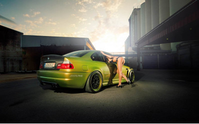 bikini-girl-peek-green-bmw-car-sunset-background.jpg